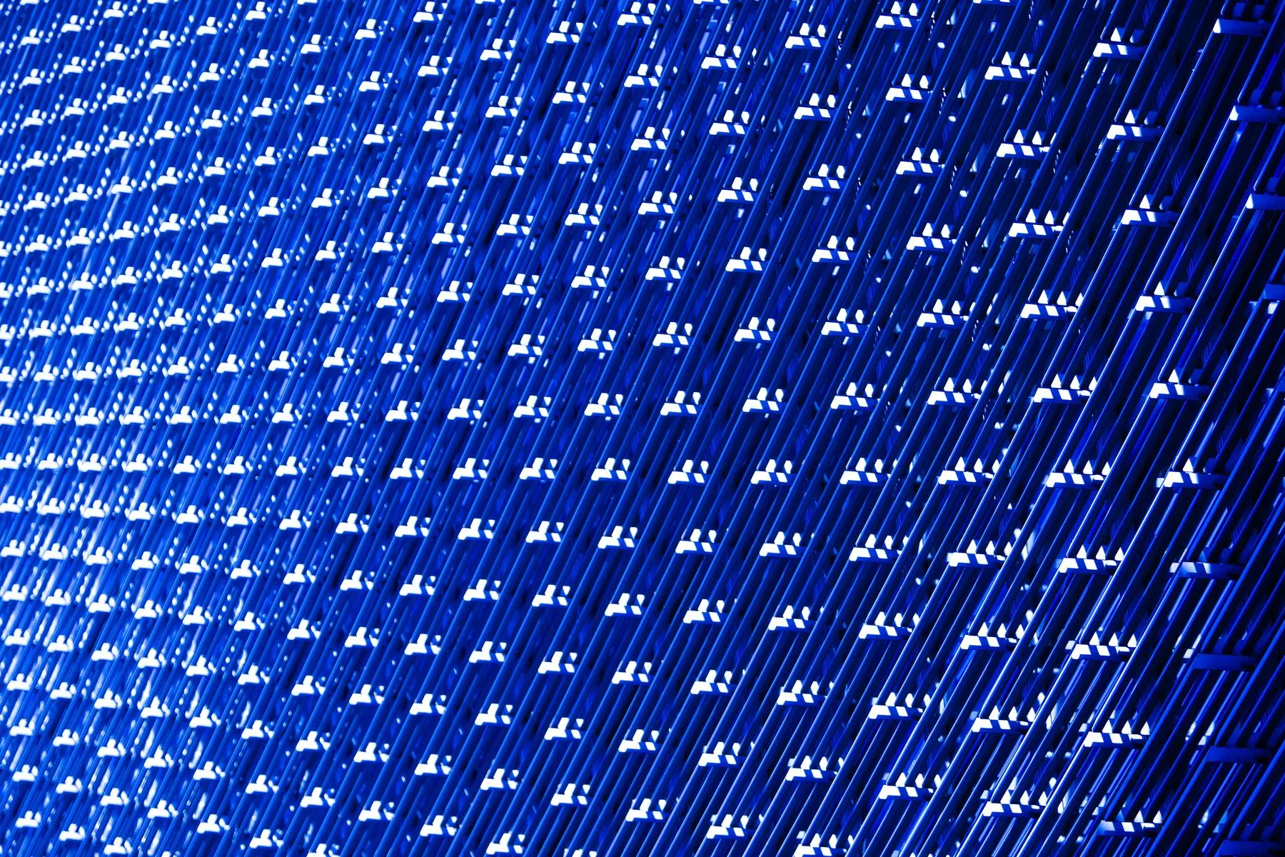 Minimal blue architectural panels meeting at a seam